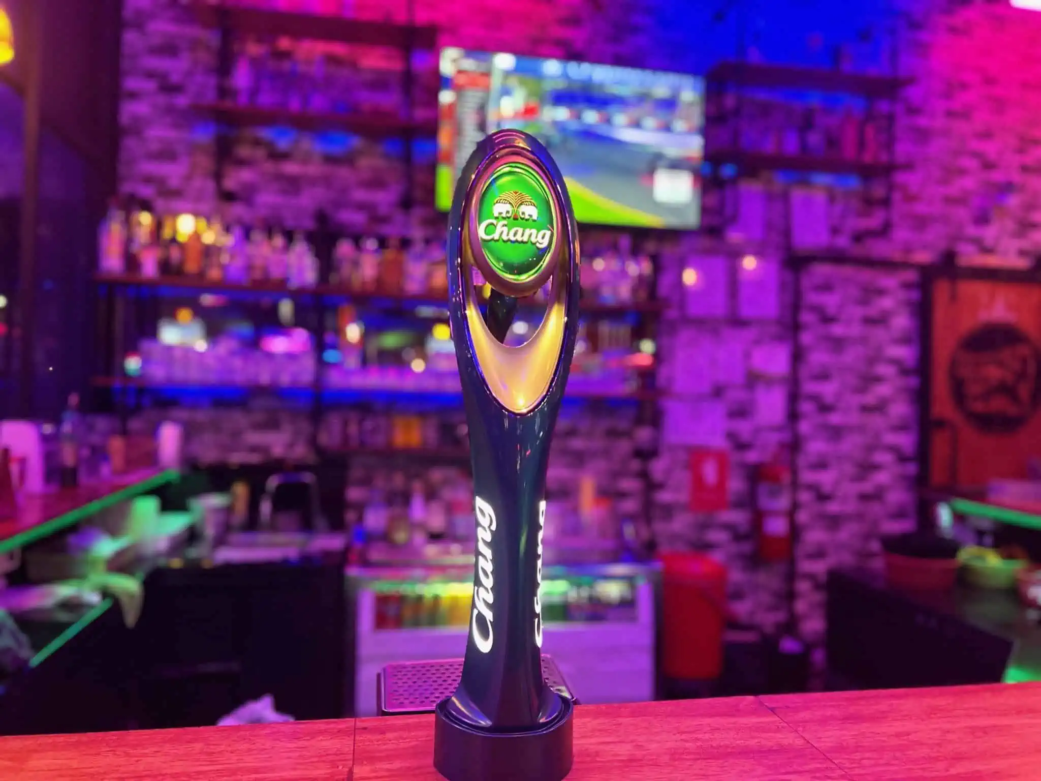 Chang beer tap handle at bar